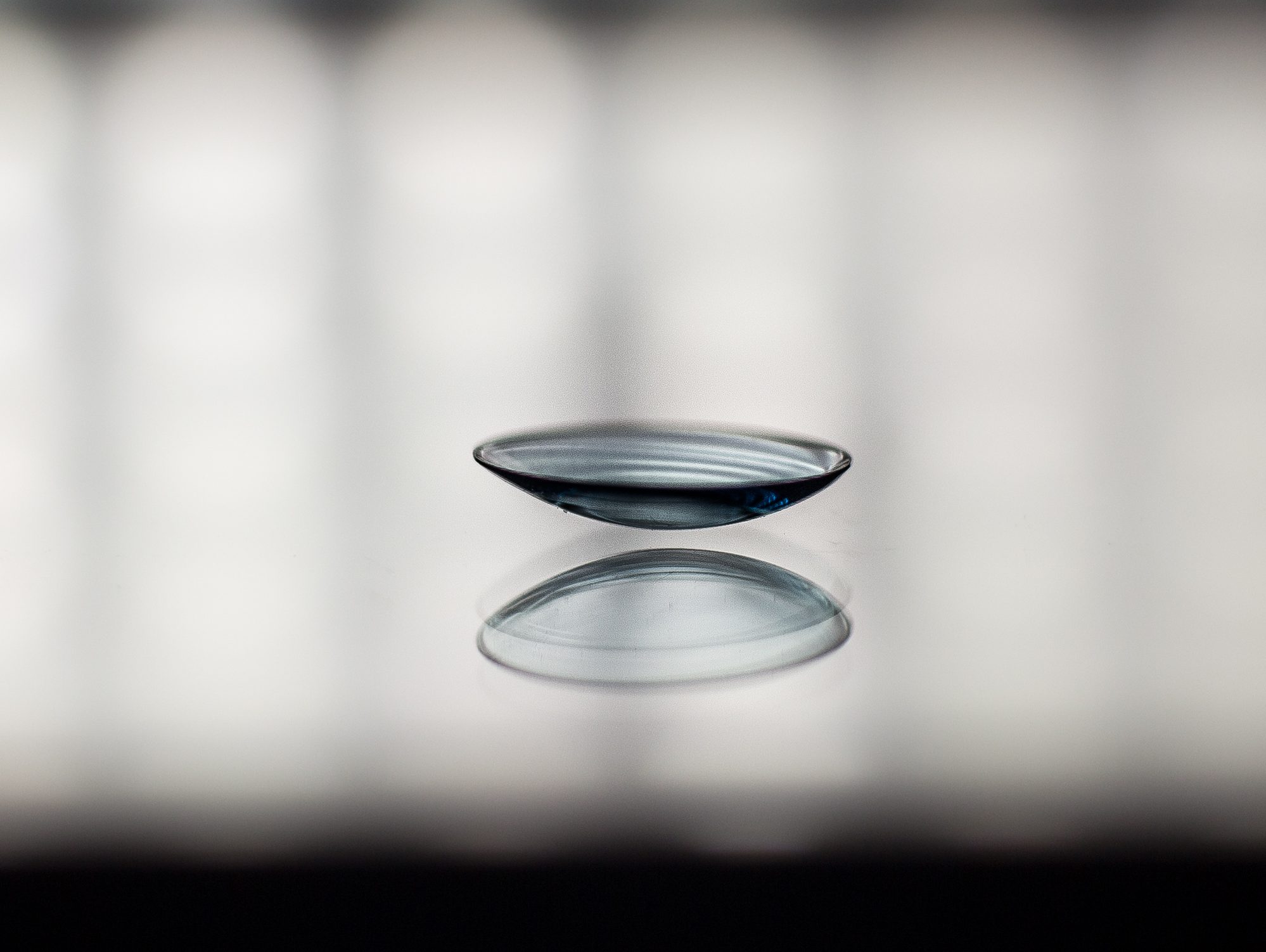 Image of GP lens on table on Specialty Contact Lenses Page