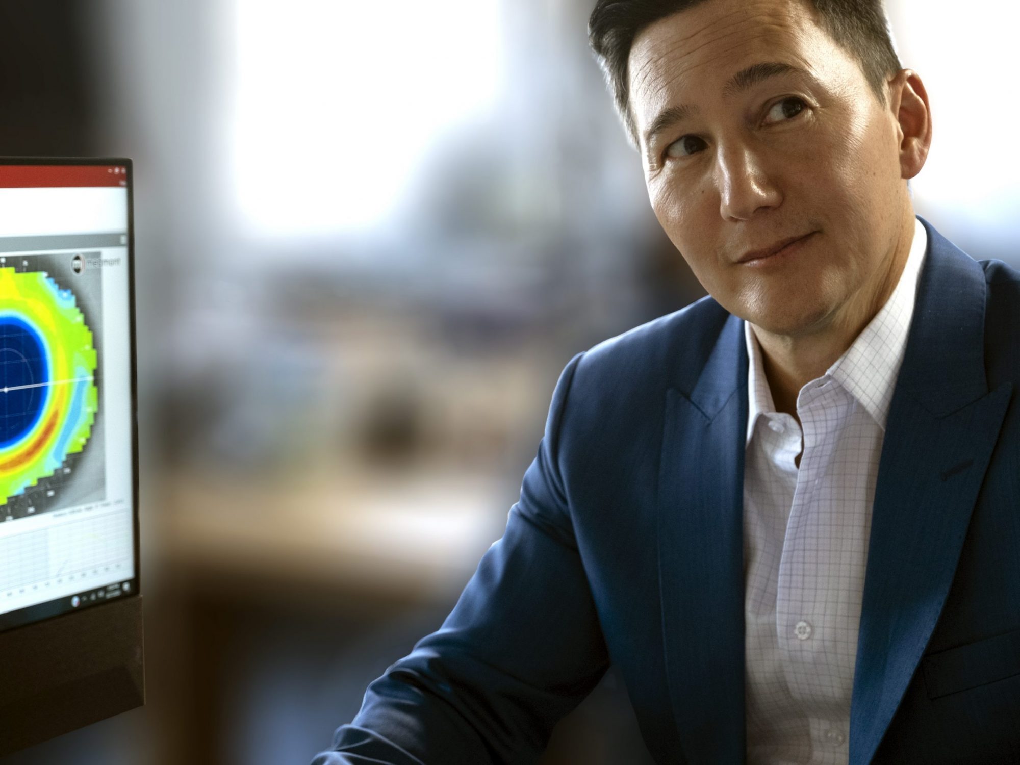 Image of Randy Kojima on table on Specialty Contact Lenses Page